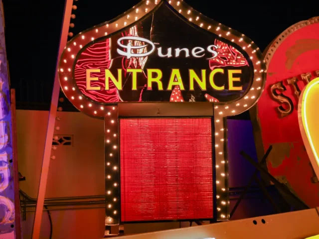 Dunes Hotel & Casino Sign Illuminated at The Neon Museum